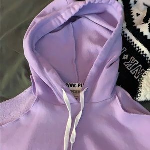 Pink sweatshirt with shoulders cut out